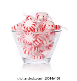 Peppermint Candy In Glass Bowl Isolated On White. 