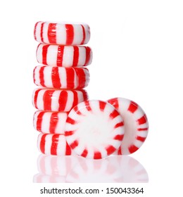 Peppermint Candy Tower Isolated On White. Red Striped Peppermint Christmas Candy, Macro. 