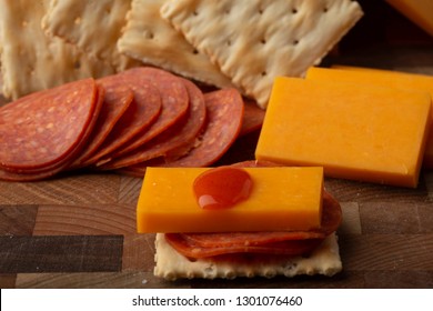 Pepperoni Cheese Crackers And Hot Sauce