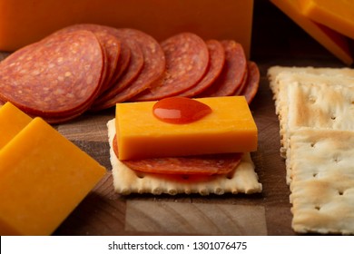 Pepperoni Cheese Crackers And Hot Sauce