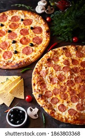 Pepperoni Pizza, Chorizo On A Dark Background, Top View, Flatlay