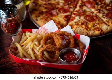 Pepperoni Pizza With French Fries And Onion Rings