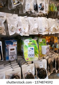 Perak, Malaysia, April 17,2019 : Packed ready different kinds of male 4 pin plug is displayed on shelf and sold at Sitiawan Electrical Shop, Kampong Koh.