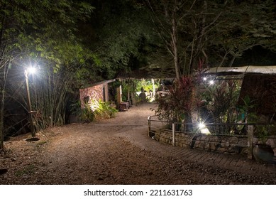 Perak, Malaysia. September 30,2022: Night Scene Along The Lamppost Pathway Street To The Local Cafeteria At Adeline Villa And Rest House, Gopeng.
