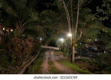 Perak, Malaysia. September 30,2022: Night Scene Along The Lamppost Pathway Street To The Local Cafeteria At Adeline Villa And Rest House, Gopeng.
