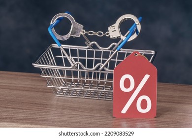 Percent Sign With Handcuffed Shopping Basket. Discounts Addiction Concept