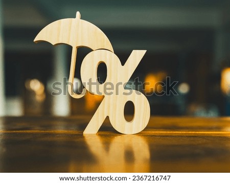 Percent symbol and umbrella concept for controlling and protecting deposit interest and loan interest.