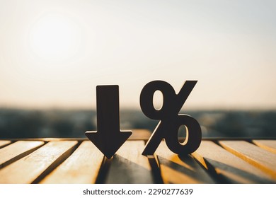 Percentage model and down arrow with evening sky Key concepts for success, methods, systems of raising or lowering Fed interest rates to correct inflation concepts.