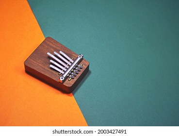 Percussion music background template with a kalimba. A high angle view shot