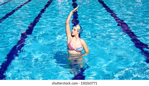 Perfect Athlete Trying Sync Swimming In Pool 