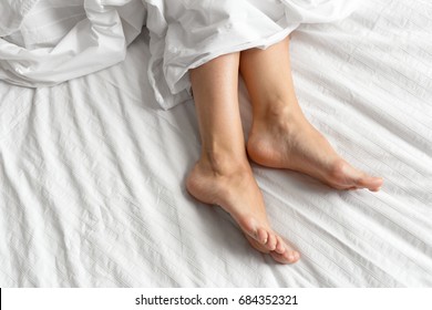 Perfect And Beautiful Woman Legs On Bed