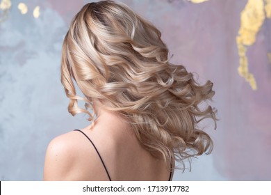 Perfect Blonde, Beautiful And Well-groomed Blonde Hair. Long Curls, Back View