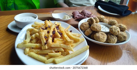 perfect breakfast with frenchfries and meatballs 