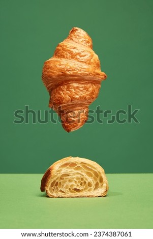 Perfect. Crispy, fresh croissant, whole and cut in half isolated over green background. Concept of food, bakery, breakfast ideas, taste, freshness. Poser. Copy space for ad