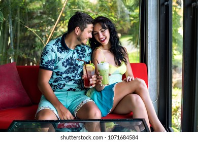 Perfect Date Image Of Young Happy Couple Drinking Tropical Cocktails On Vacation, Bright Summer Clothes, Love And Smiling Atmosphere.