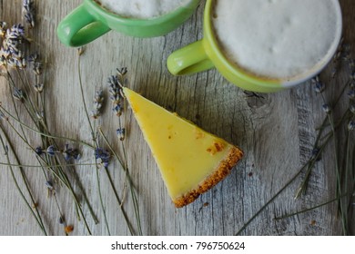 Perfect Dessert With Florida Key Lime Pie And Two Cups Of Coffee. Lime Tart Slice And Green And Yellow Cups Of Cappuccino. Lavender And Wooden Tray. Great Instagram Layout.