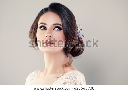 Perfect Fashion Model Woman with Beautiful Hairstyle. Prom or Bride Girl