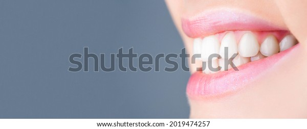 Perfect healthy teeth smile woman. Teeth\
Whitening. Dental health Concept. Teeth whitening procedure. Dental\
care. Dentistry\
concept.