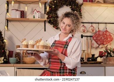 Perfect Housewife In Her Perfect And Cozy Kitchen. Christmas Mood, Red Apron.