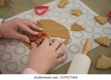 Perfect Housewife In Her Perfect Kitchen. A Woman In A Red Dress Prepares Cookies.