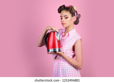 perfect housewife. pin up woman with trendy makeup. pinup girl with fashion hair. retro woman cooking in kitchen. pretty girl in vintage style. presenting product.