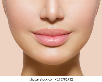 Perfect Lips. Sexy Girl Mouth close up. Beauty young woman Smile. Natural plump full  Lip. Lips augmentation. Close up detail
