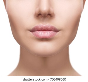 Perfect natural lips of young woman.