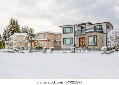 A Perfect Neighborhood. Houses In Suburb At Snow Winter In The North America.