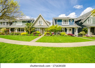 A Perfect Neighborhood. Houses In Suburb At Spring In The North America