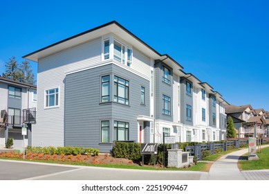 A perfect neighbourhood. Brand new townhouses for sale on spring season - Shutterstock ID 2251909467