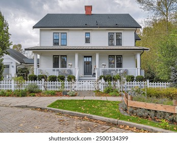 A perfect neighbourhood. Luxury family house in old colonial style - Powered by Shutterstock