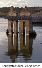 Perfect Reflexion On Water For An Old Ruined House 