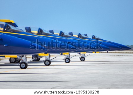 perfect row of blue planes