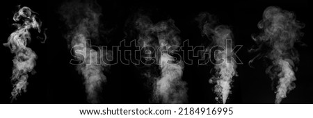 A perfect set of five different mystical curly white steam or smoke on a black background. Fog or smoke set isolated on black background. Curly smoke on a dark background