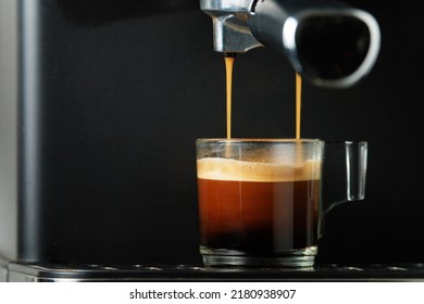 Perfect shot of the espresso shot in a thin layer is the thin, golden-brown to brownish-red layer called the crema - Shutterstock ID 2180938907