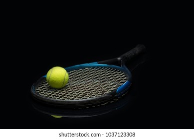 Perfect Shot Of A Tennis Ball On A Racket