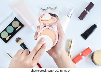 Perfect Skin Compact Foundation On Hand Of Woman Using Sponge Touch Powder On Flat Lay Accessories Make Up Background