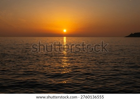 Perfect Sunset Reflection on a Wild Croatian Beach, The Adriatic Holding the Last Light