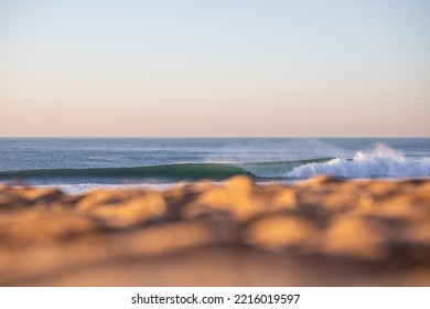 Perfect Surfing Wave Breaking A Beach With No People