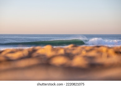 Perfect Surfing Wave Breaking On A Beach With No People