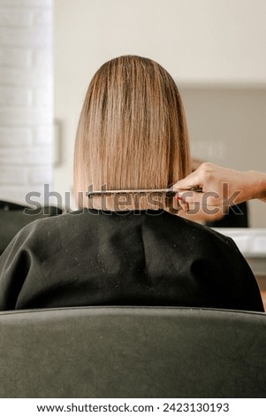 Perfecting a straight bob haircut at a hair salon