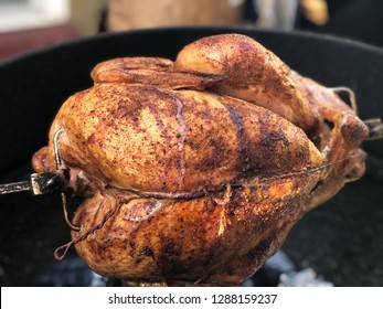 Perfectly Browned Rotisserie Turkey On The Barbecue