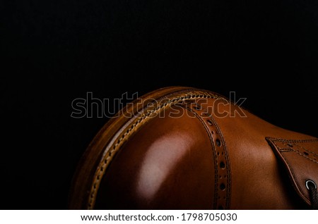 Perforation on the toe of the boot, macro shot