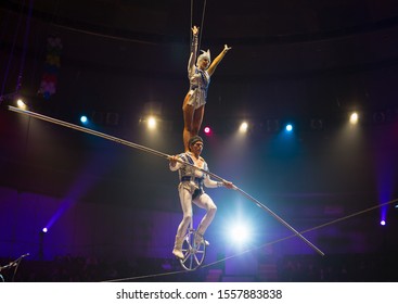 performance of aerialists in the circus arena