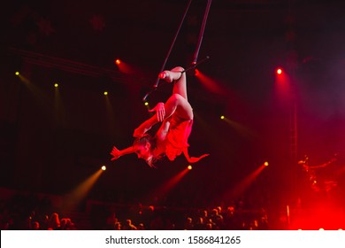 Performance Of Aerialists In The Circus Arena