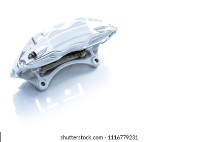 Performance braking system, 
New Silver racing brake caliper 
Auto parts on white background.
