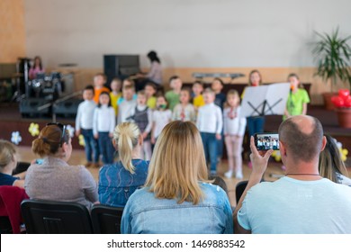 Performance By Talented Children. Children On Stage Perform In Front Of Parents. Image Of Blur Kid 's Show On Stage At School , For Background Usage. Blurry