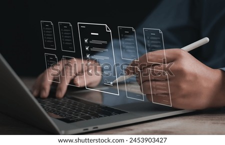 Performance checklist concept : businessman using stylus pen with laptop for questionnaire, evaluation, assessment online or survey exam and filling out for digital survey and checklist.	
