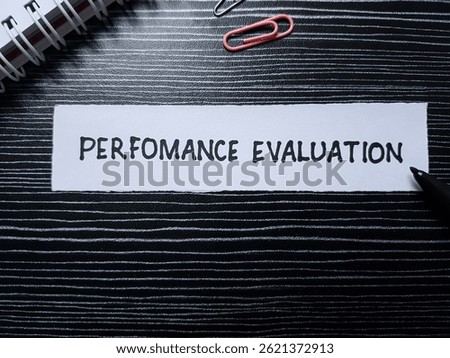 Performance evaluation writting on table background.
