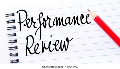 Performance Review Written On Notebook Page With Red Pencil On The Right